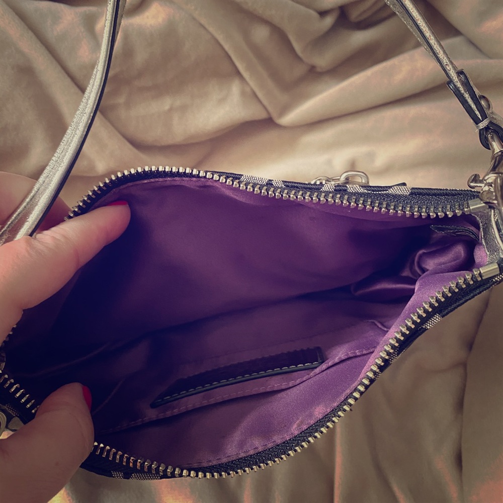 Black and silver Coach purse